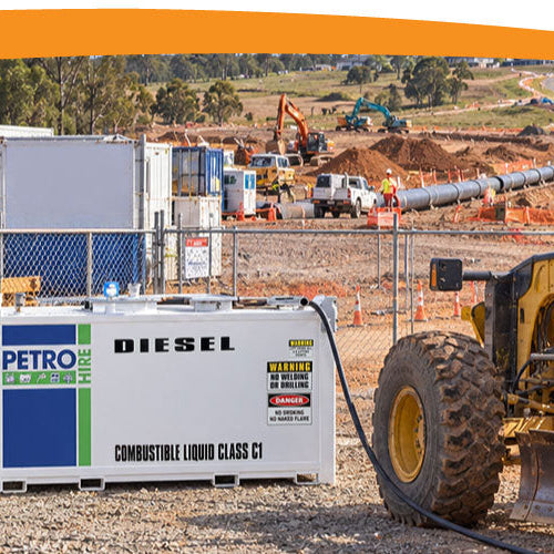 2 x PETRO HIRE Cube fuel storage tanks on a construction site