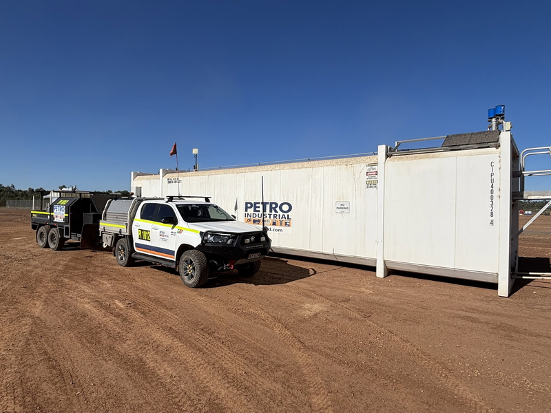 PETRO vehicle beside a tank on a remote site