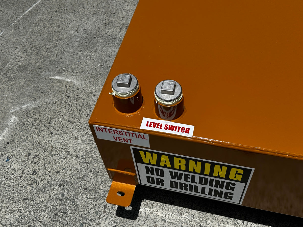 Orange fuel tank with level switch label and interstitial vent