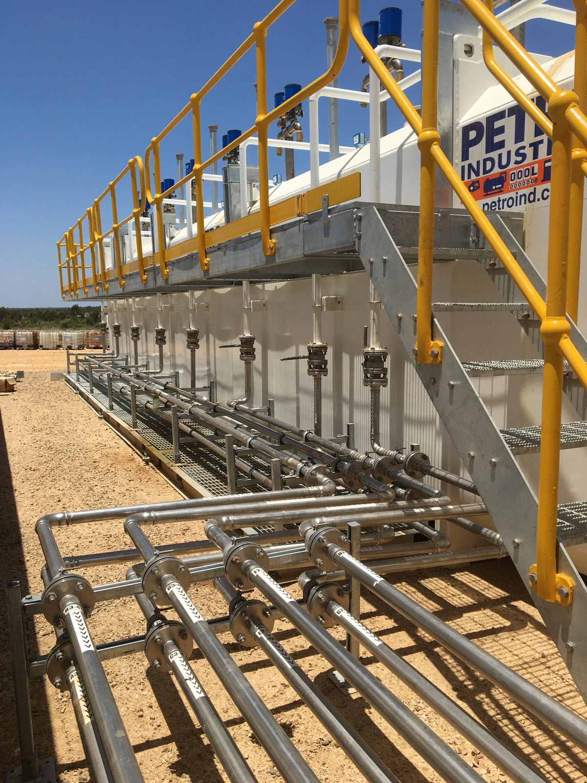 PETRO multi-compartment tank with pipe work and access stairs