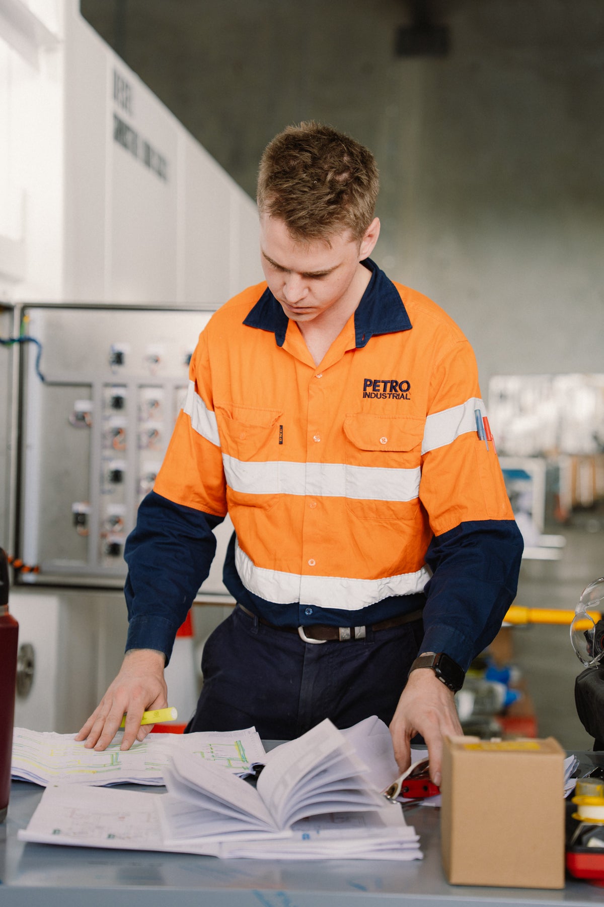 PETRO Industrial team member inspecting equipment
